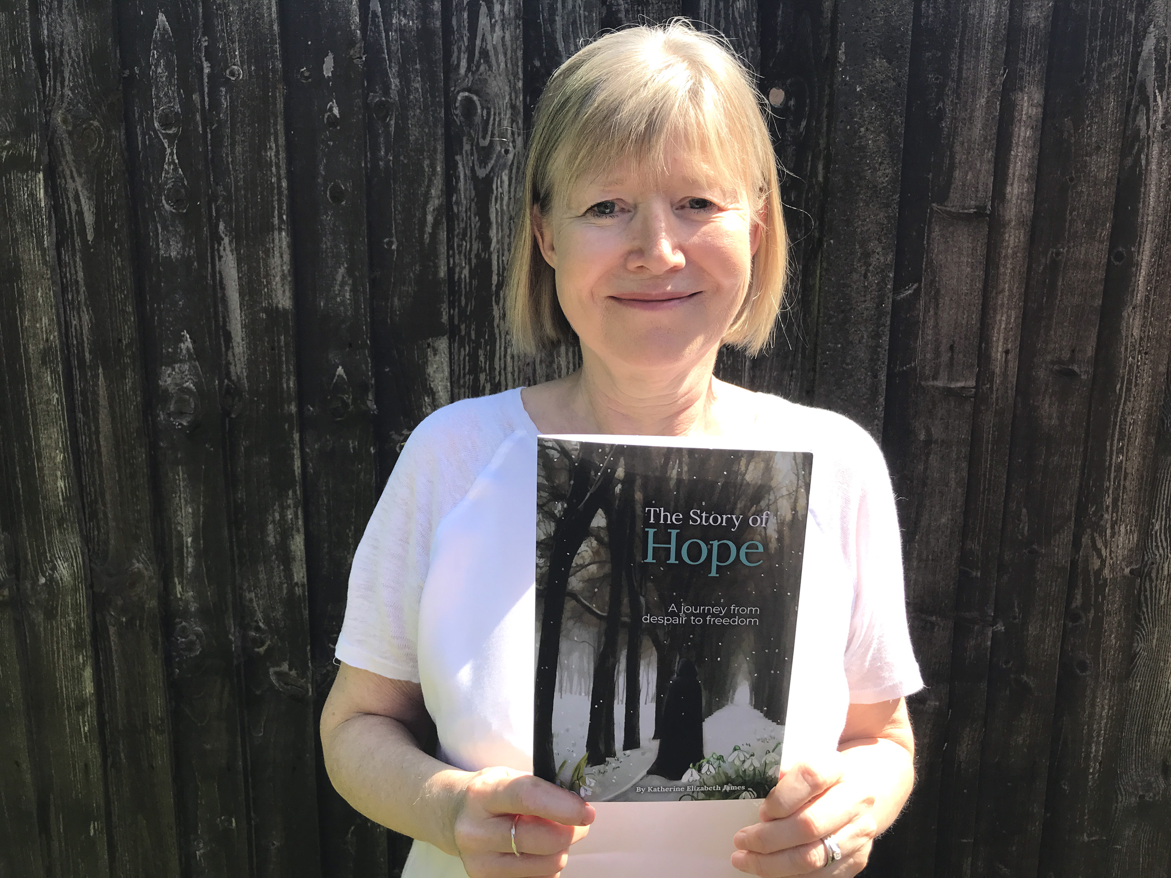 katherine-holding-book-new2-300dpi-rgb